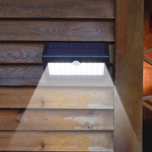 Carregar imagem no visualizador da galeria, Luz SOLAR com sensor de movimento - super brilhante, sem necessidade de fiação, Fácil instalação